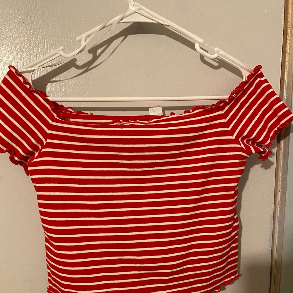 Red stripped off the shoulder